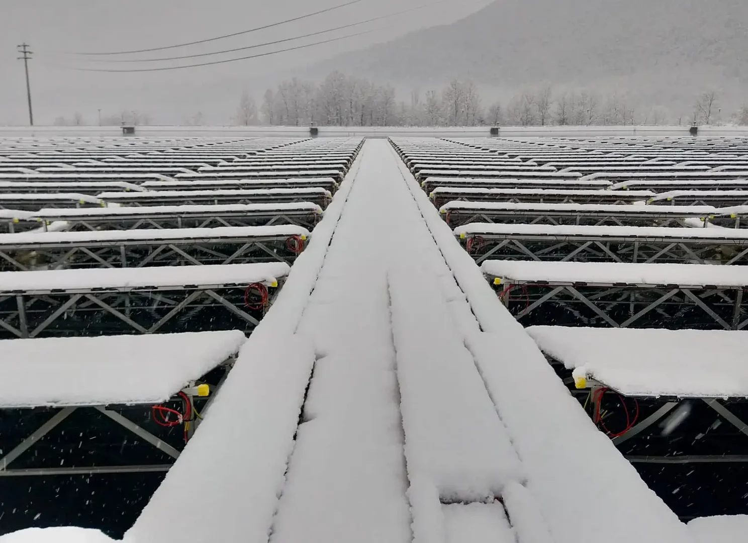 NRG Island Floating PV System covered by snow in Venaus